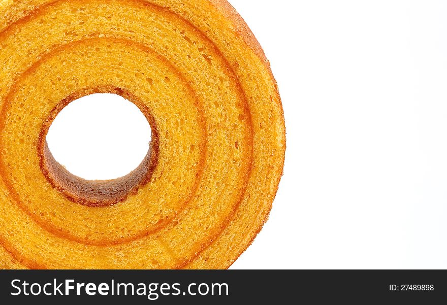 Sponge cake  orange  isolated on white background. Sponge cake  orange  isolated on white background