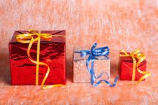 Gift Boxes On An Orange Background Stock Photo