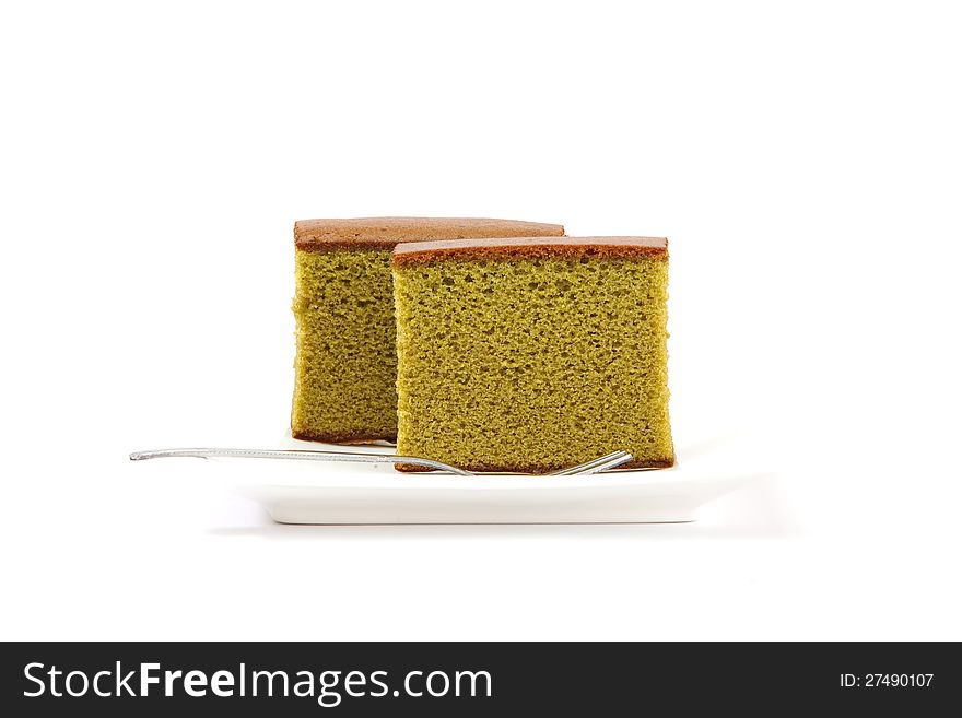 Sponge cake  green tea isolated on white background. Sponge cake  green tea isolated on white background