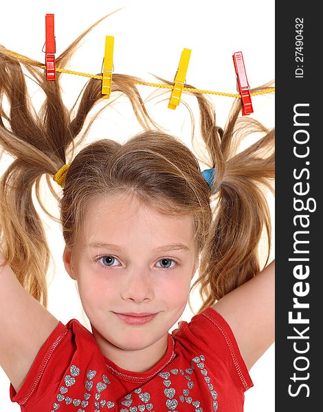 Girl with paperclips in hair on the white background