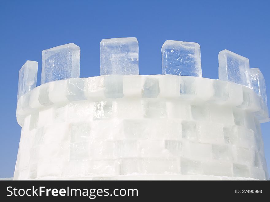 Ice castle against a blue sky