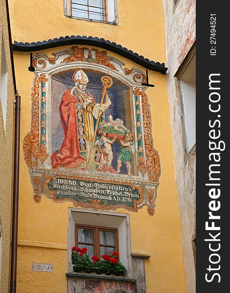 Port Ragen - fresco depicting the Bishop Bruno (1922) - Brunico - South Tyrol - Italy. Port Ragen - fresco depicting the Bishop Bruno (1922) - Brunico - South Tyrol - Italy