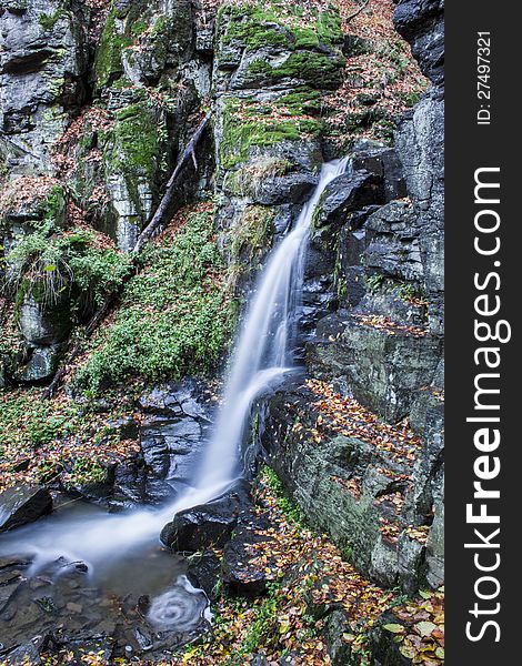 Waterfall in during the Autumn season.