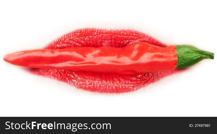 Piquant red pepper in a woman's lips. On a white background. Piquant red pepper in a woman's lips. On a white background.