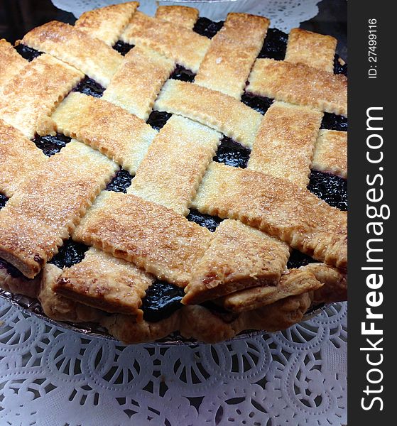 Home made black berry blue berry pie basket weave criss cross pastry top
