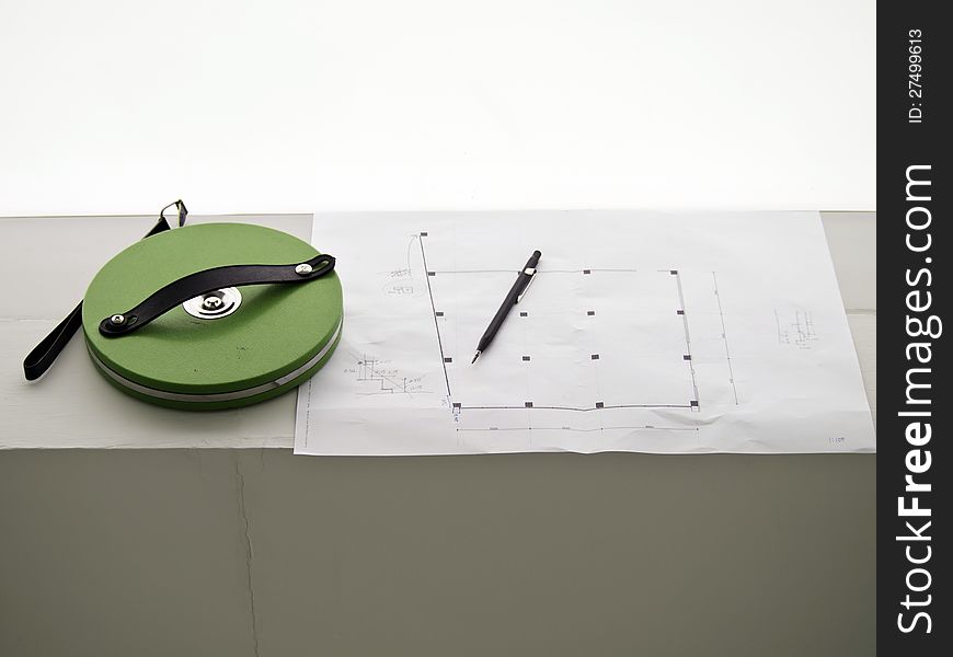 Measuring Tape, Pencil And Construction Drawing