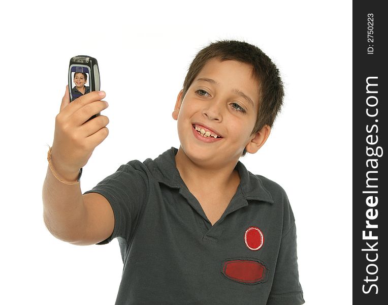 Boy taking his photo with a mobile phone. Boy taking his photo with a mobile phone