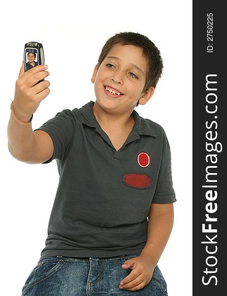 Boy taking his photo with a mobile phone. Boy taking his photo with a mobile phone