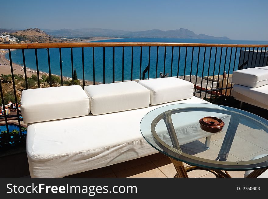 Sea view from the bar of a luxury hotel, bright sun , Rhodes, Greece. Sea view from the bar of a luxury hotel, bright sun , Rhodes, Greece.