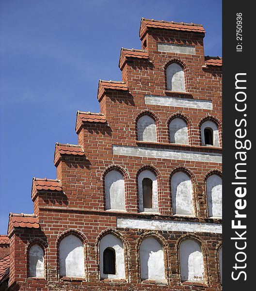 The facade of a gothic style house in the old town of Kaunas city, Lithuania. The facade of a gothic style house in the old town of Kaunas city, Lithuania.