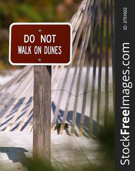 Warning sign at the sand dunes. Warning sign at the sand dunes.