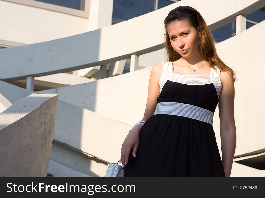 Happy beauty sexy girl on business building. Happy beauty sexy girl on business building