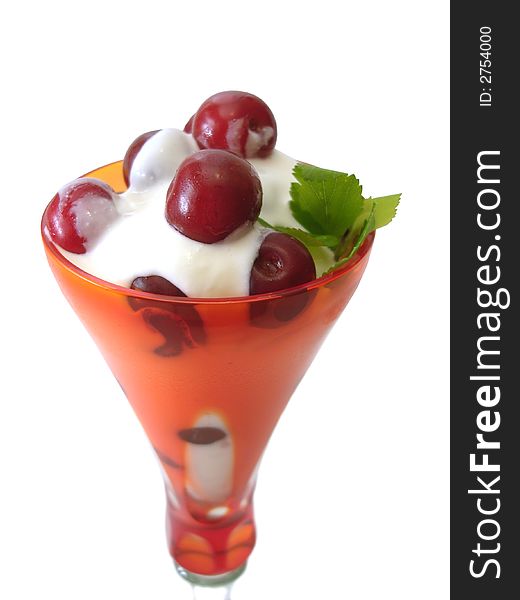 Dessert in glass isolated on white(cherry with cream)