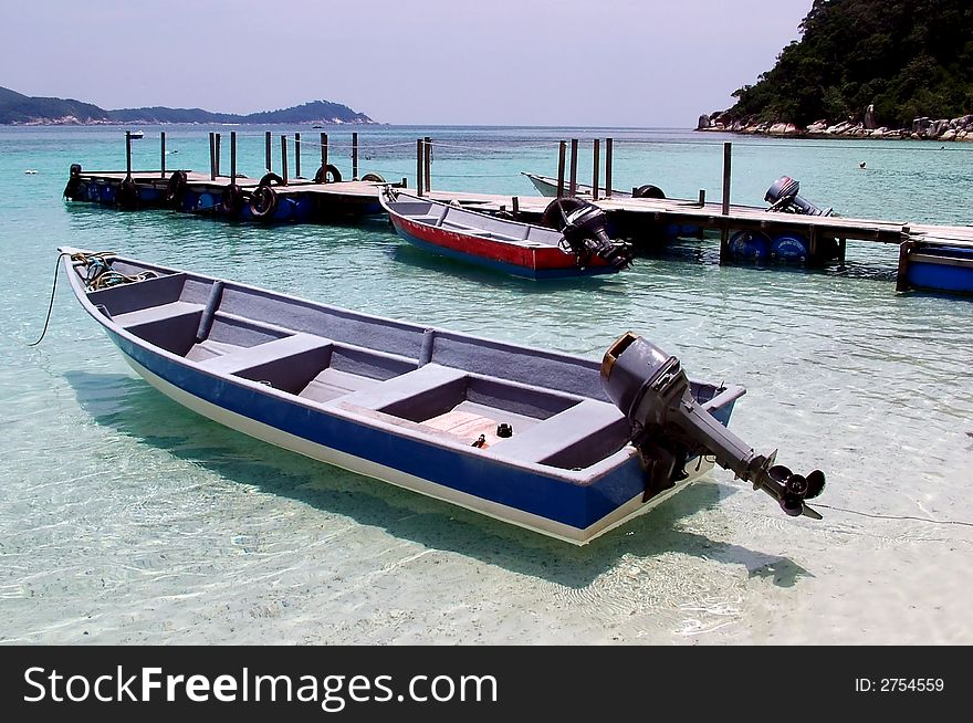 Fisherman boat image on the beautiful beach