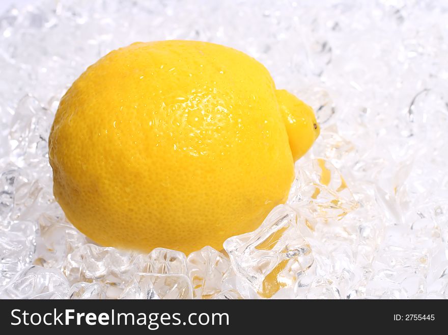 Whole Lemon on a bed of ice. Whole Lemon on a bed of ice