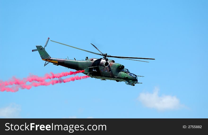 Helicopter Mi-24 opposite blue sky
