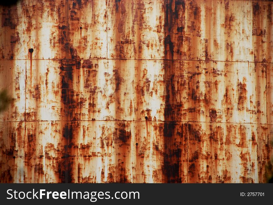 Rusty metal brownish and orange background. Rusty metal brownish and orange background