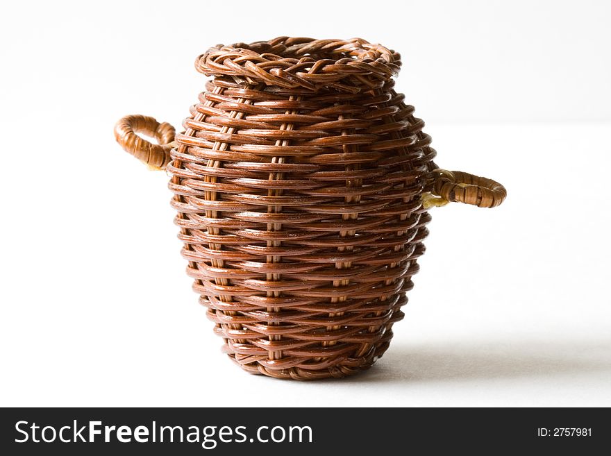 Woven basket on a white background