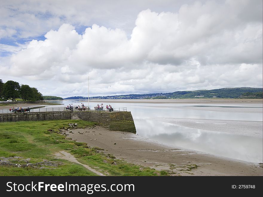 Arnside pier with Grange-over-Sands in the background