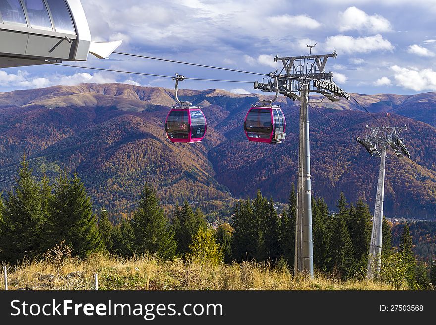 Two cable cars arriving in the station