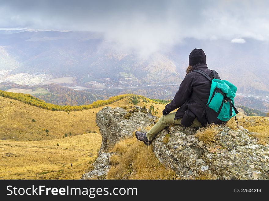 Mountain climber taking a rest. Mountain climber taking a rest