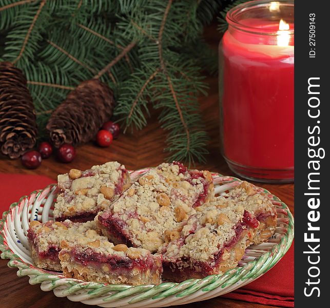 Holiday cranberry and peanut butter bars on a plate. Holiday cranberry and peanut butter bars on a plate