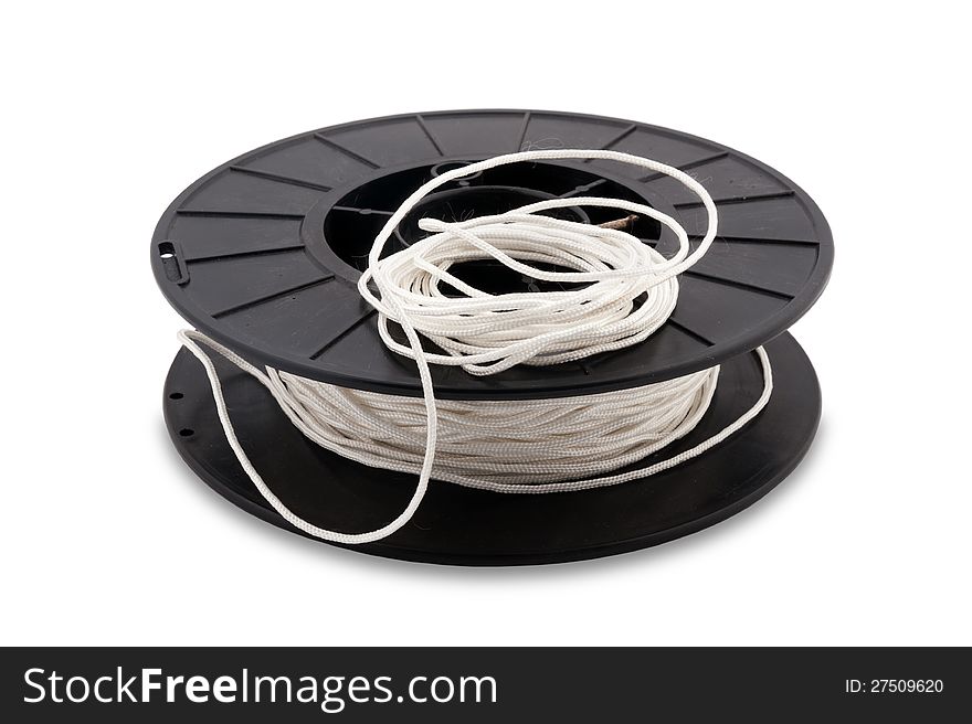 Photo of black coil with white rope on a white background. Photo of black coil with white rope on a white background