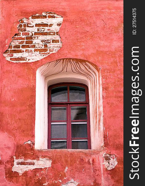 Window of old 19th century building in Russia