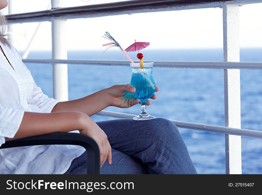 Girl Drinking A Cocktail On A Journey
