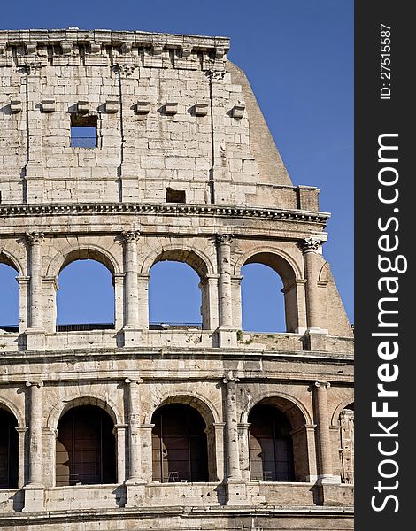 The Colosseum, the world famous landmark in Rome, vertical detail, Italy.