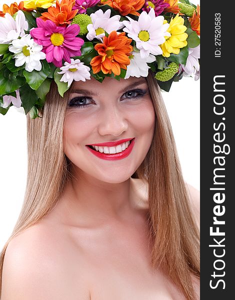 Beautiful young girl with flowers