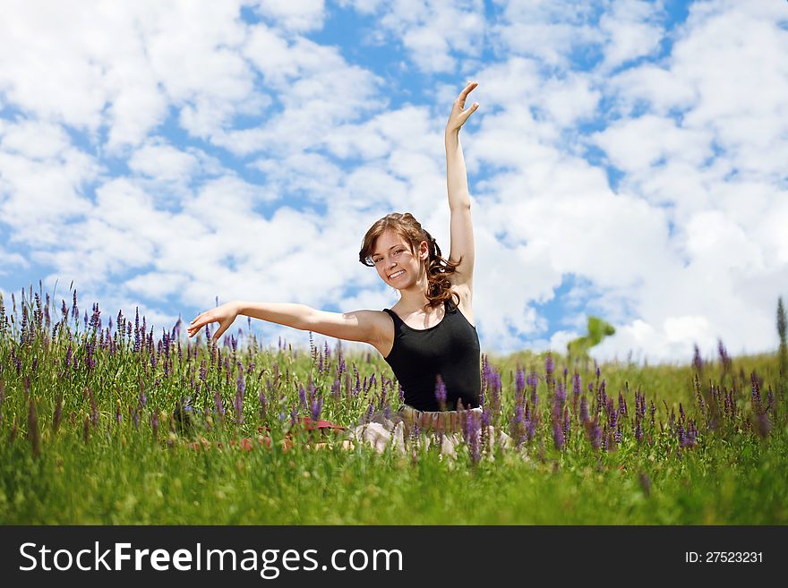Young beautiful girl in the in lavender field. Young beautiful girl in the in lavender field
