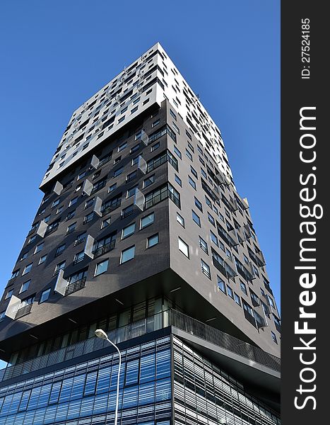 This image presents a modern and very beautiful apartment building in Groningen, Holland. This image presents a modern and very beautiful apartment building in Groningen, Holland