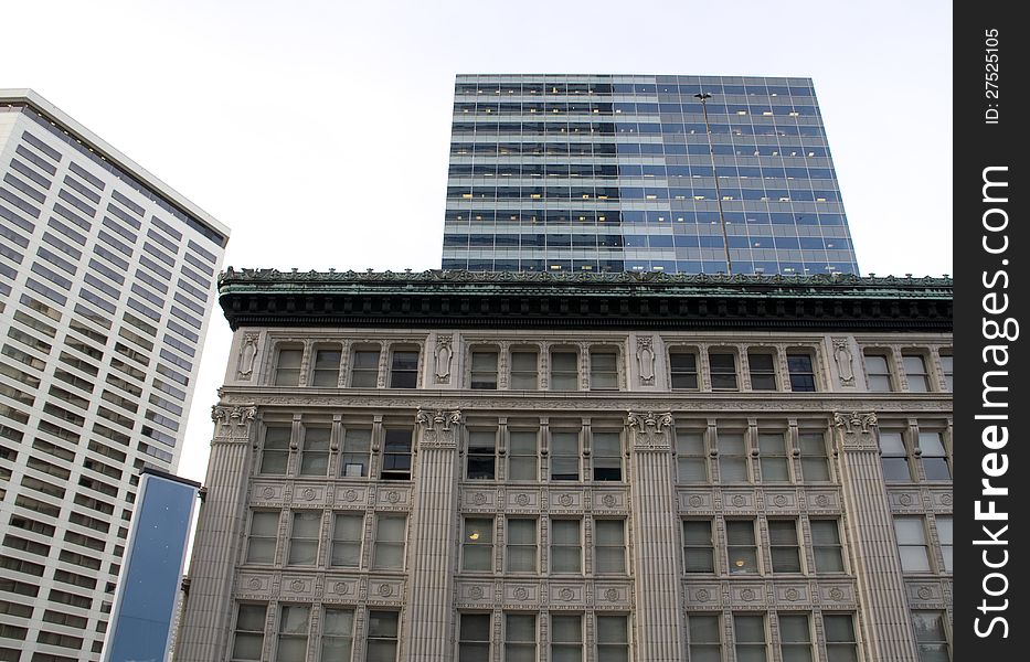 Old and new buildings are together in downtown Seattle. Old and new buildings are together in downtown Seattle
