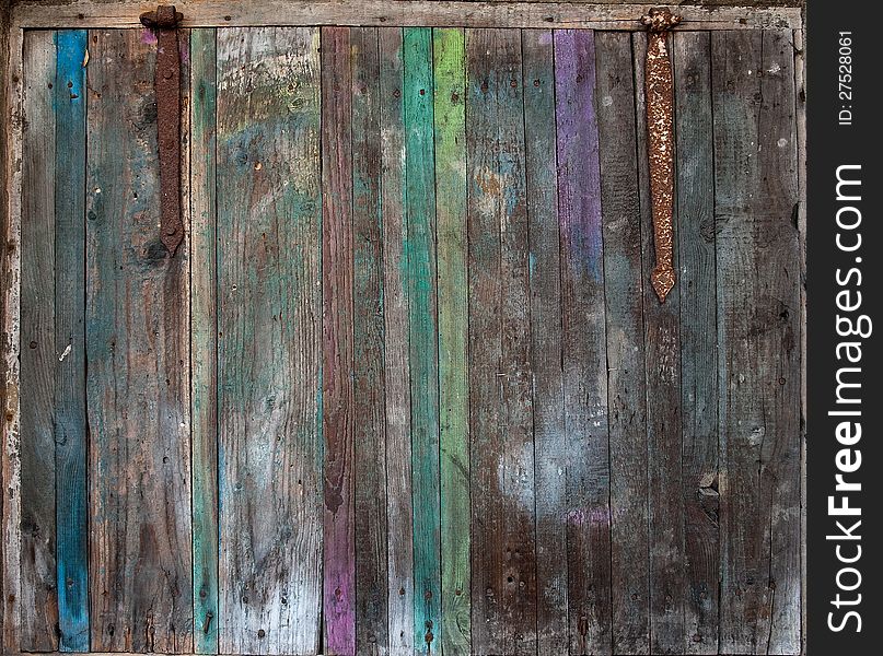 The old wooden vintage colored door