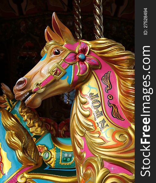 The Colourful Head of a Fun Fair Carousel Horse.