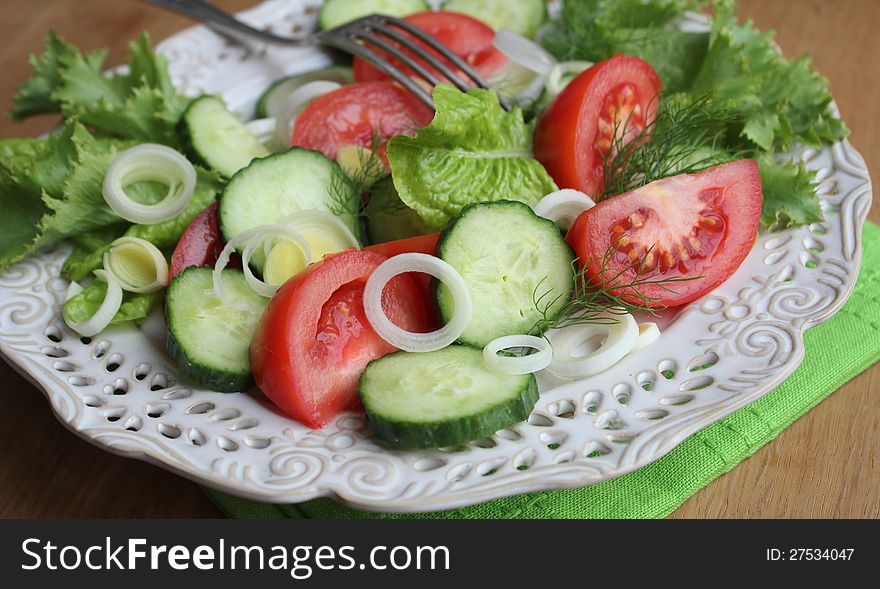 Fresg salad with cucumber, tomato and lettuce. Fresg salad with cucumber, tomato and lettuce