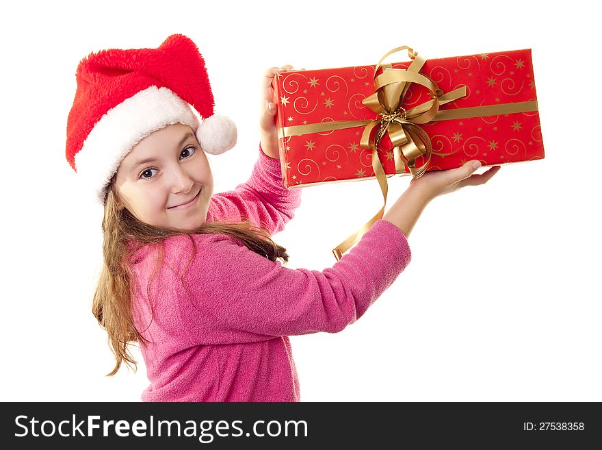 Cute little girl with Santa s hat and red present in her hands