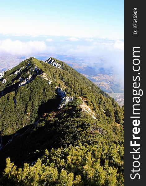 This image present the crest of Piatra Craiului mountain as seen from it`s highest point, at 2244 m. This image present the crest of Piatra Craiului mountain as seen from it`s highest point, at 2244 m.