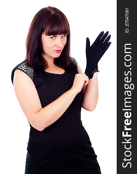 Beautiful girl poses, wears gloves