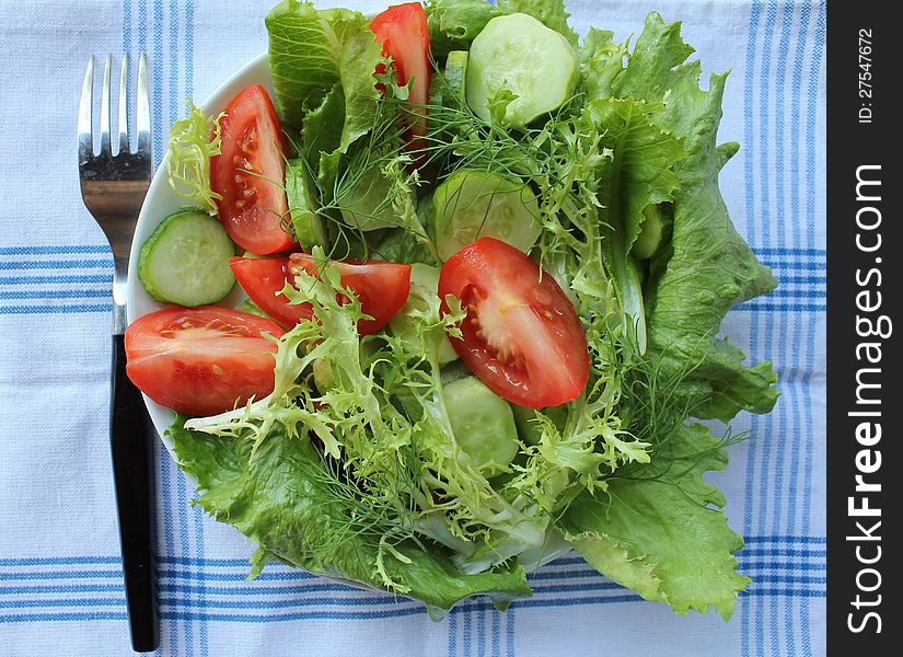 Healthy salad ( cucumber, tomato, lettuce,dill)