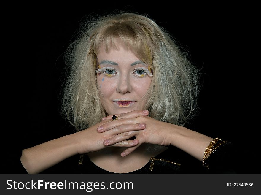 Girl with light hair in a make-up of an angel. Girl with light hair in a make-up of an angel