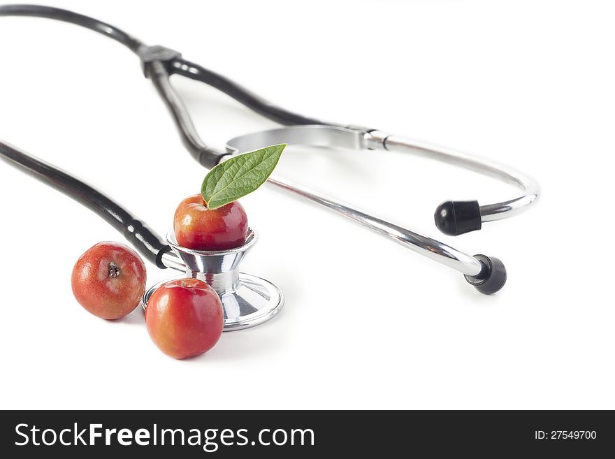 Stethoscope and fresh apple-healthy life