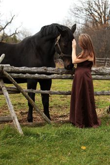 Formal Young Lady And Her Horse Stock Photo