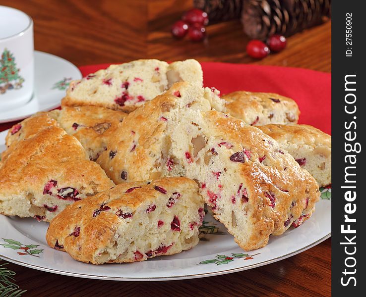Cranberry and nut scones on a Christmas plate. Cranberry and nut scones on a Christmas plate