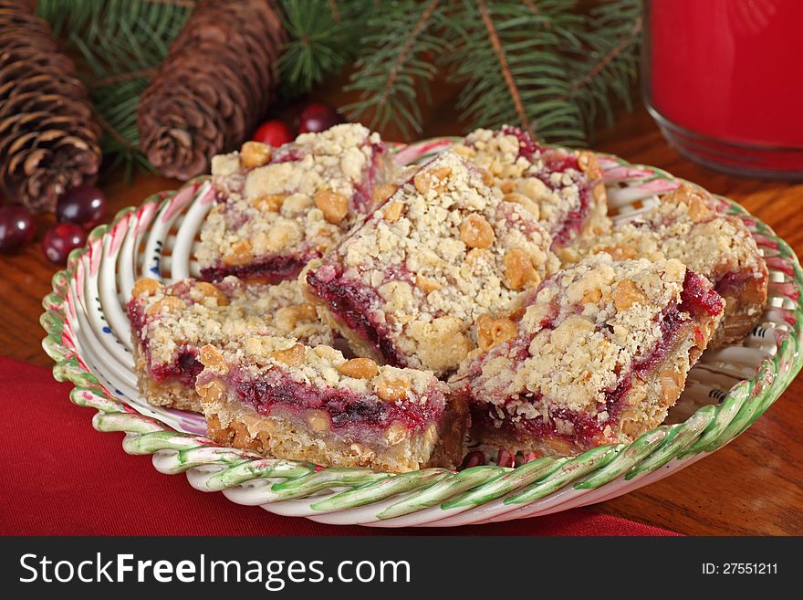 Christmas cranberry and peanut butter bars on a plate