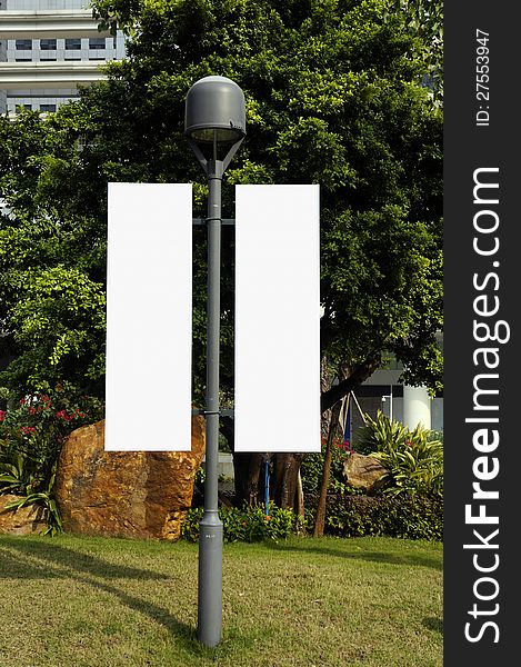 Blank Signpost On Lamppost