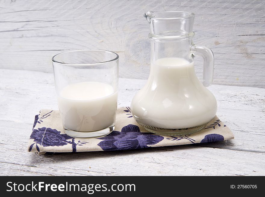 Jug And Glass With Milk And Sugars