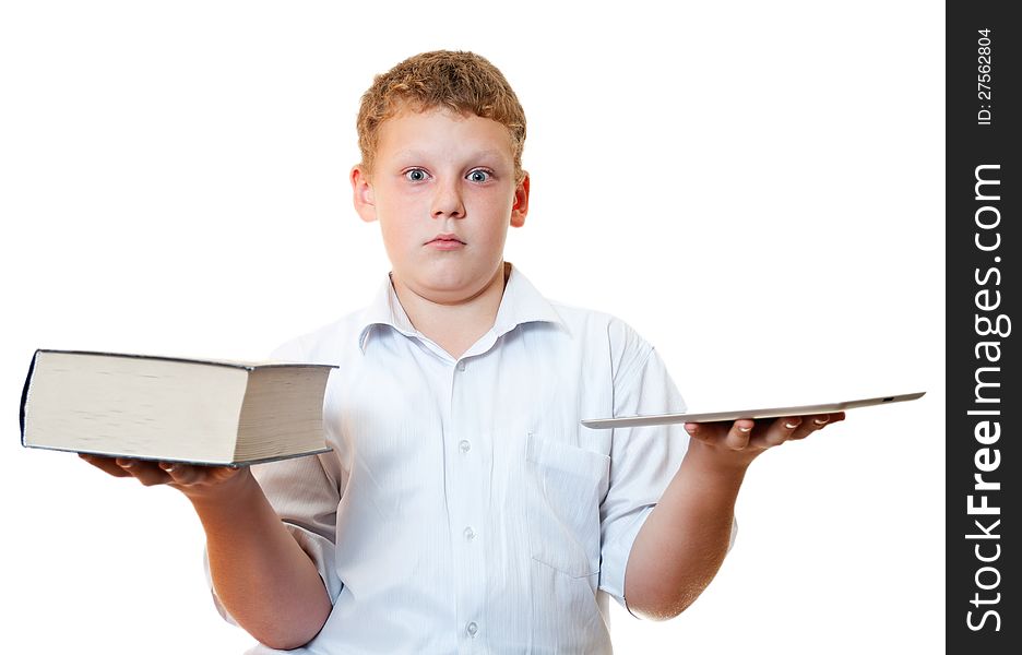 The boy with the book and tablet computer on a white background