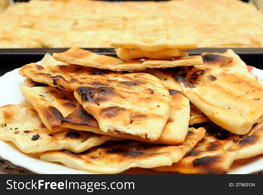 Grilled pieced of italian flatbread. Grilled pieced of italian flatbread